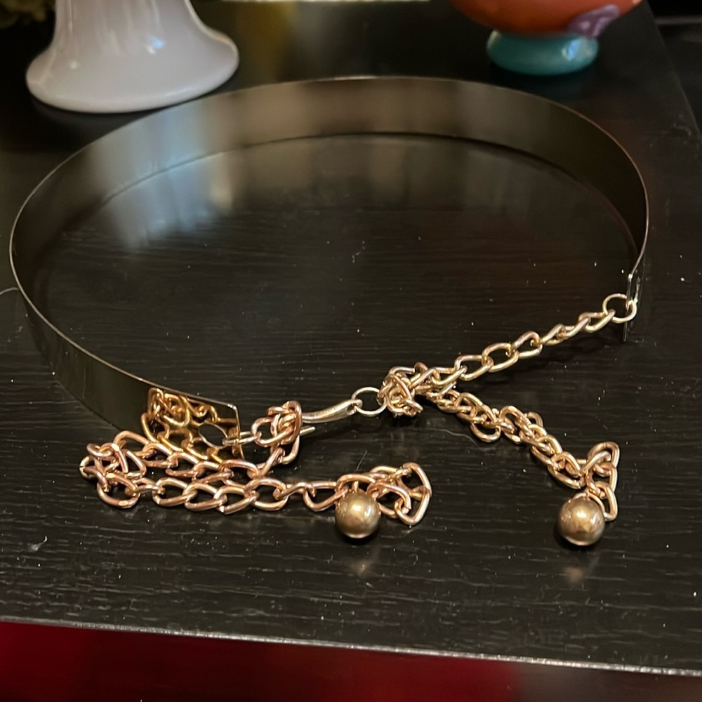 Gold metal belt with chain in front